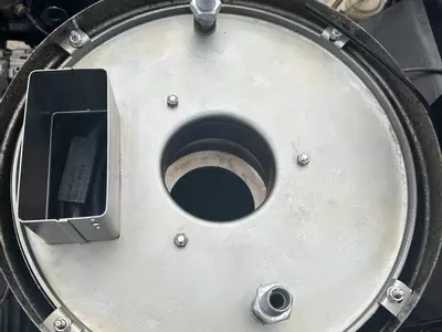 Boiler housing reassembled on Nilfisk Contractor diesel hot pressure washer after installing new heating coil.